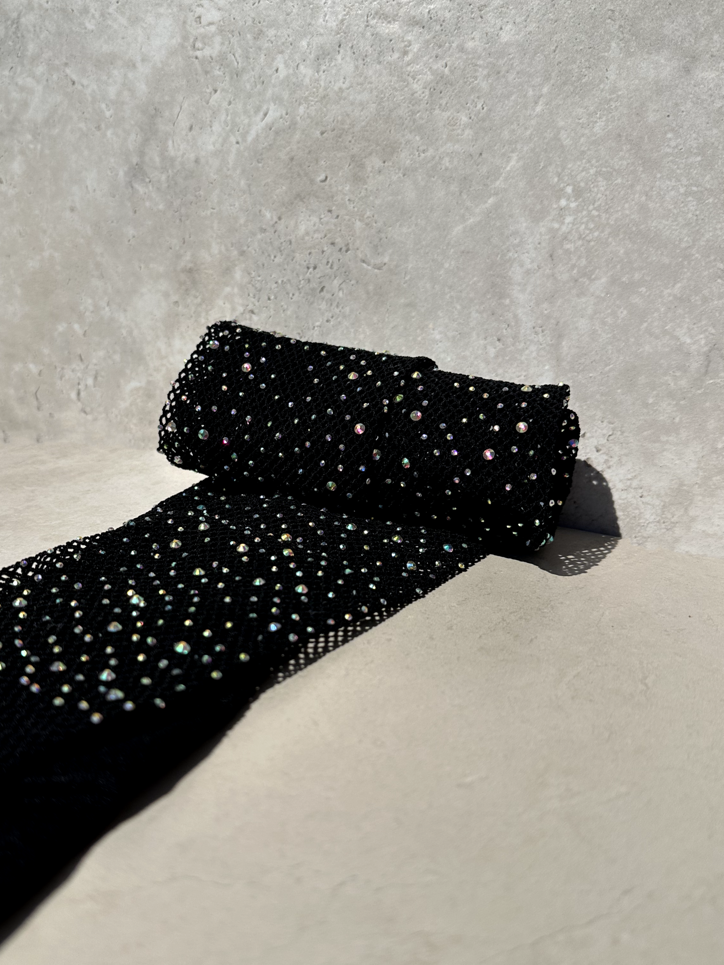Professional Black fishnet tights covered in AB diamantés