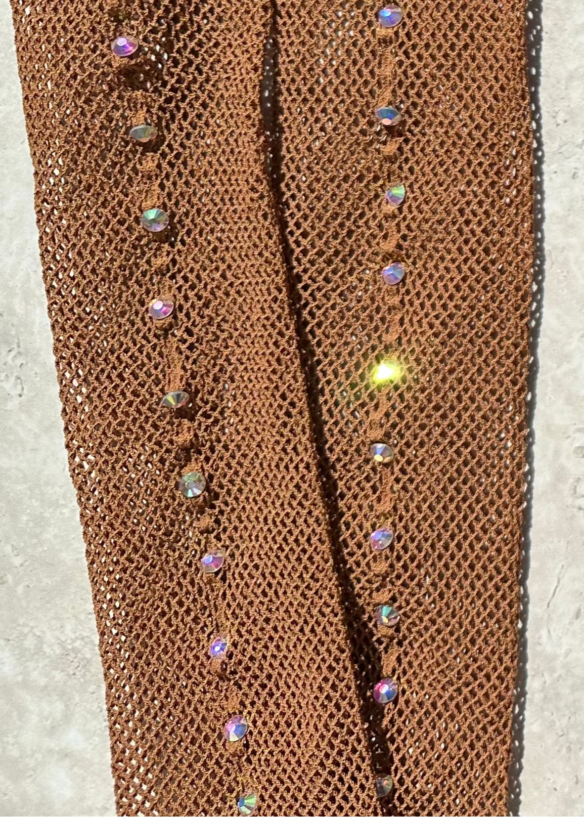 Dark tan, Bettie professional fishnet tights with back seam full of diamantés